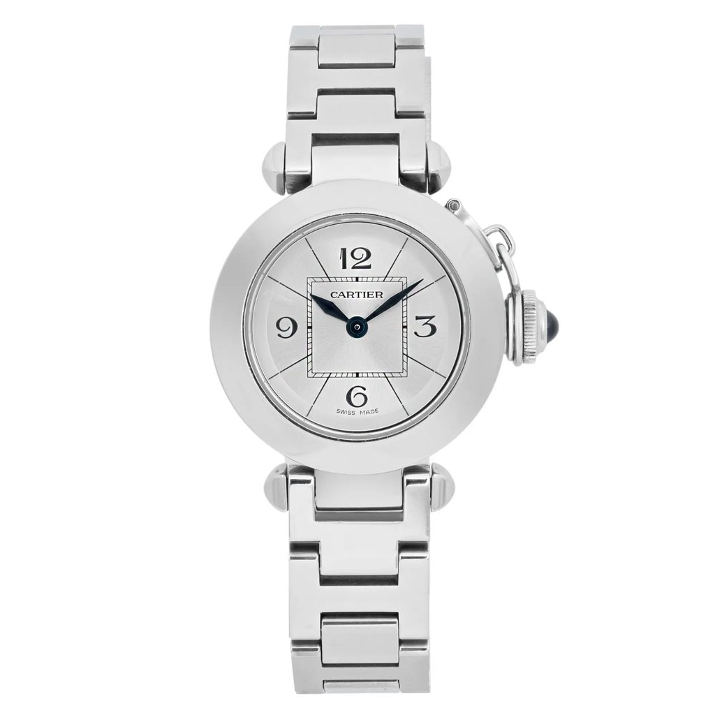 An image of a pre-owned Cartier Miss Pasha 27mm women's quartz wristwatch. The watch is centered in the frame, positioned upright with a frontal view, showcasing its round silver face and stainless steel bracelet. The crown is visible on the right side. The angle is straight-on, highlighting the minimalist design and elegant numerals at 12, 3, 6, and 9 o'clock. The image is taken at a close distance, emphasizing the details of the watch face and bracelet links.