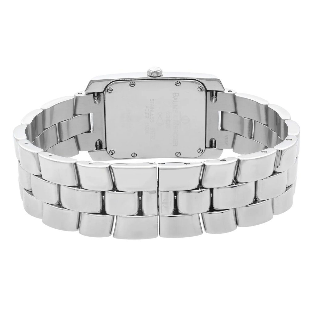 An image of a pre-owned wristwatch taken from the back view, focusing closely on the closed clasp. The angle highlights the metallic links of the band and the watch's case back, providing a clear view of its polished stainless steel surface.