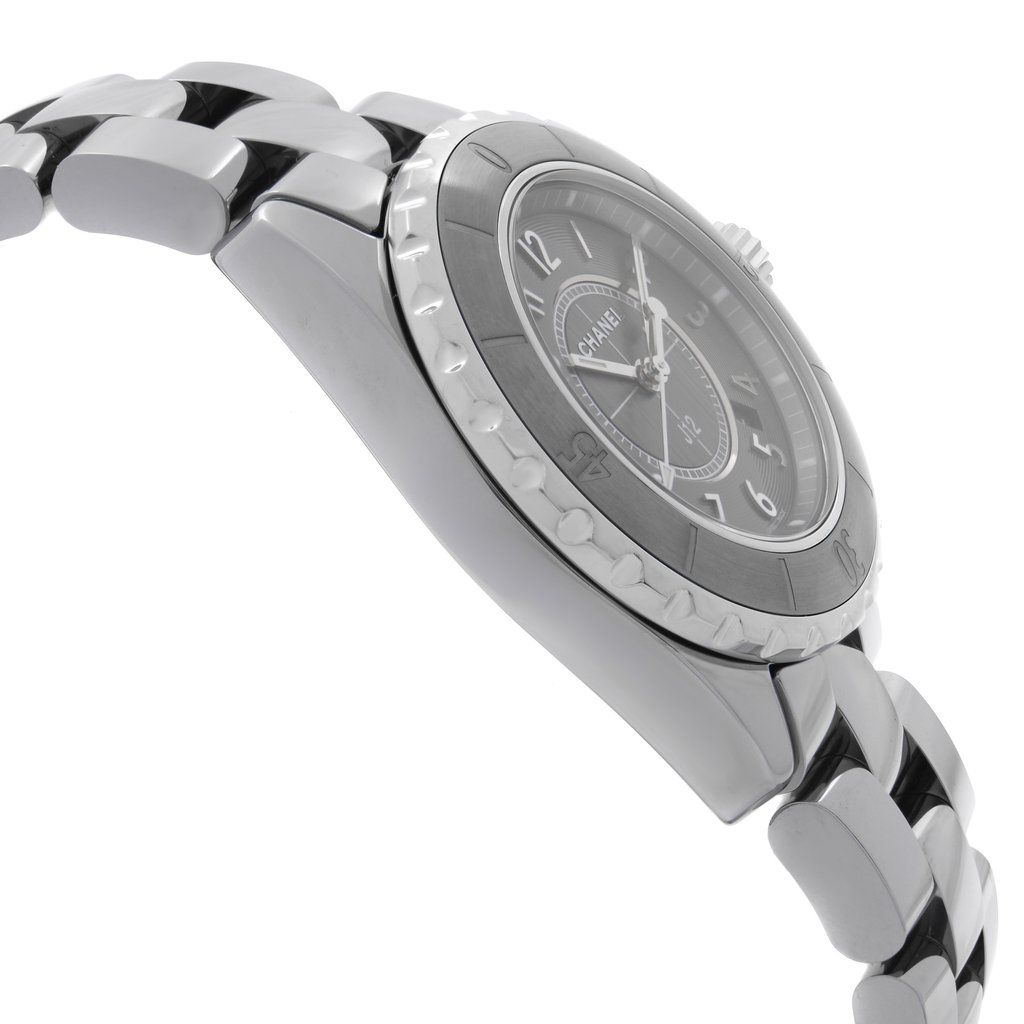 An image of a pre-owned wristwatch shown from a side profile view, opposite the crown. The focus is on the metal band and side of the watch case, displaying the detailed links and bezel. The angle highlights the curvature of the watch, with the face partially visible, taken from a close distance.
