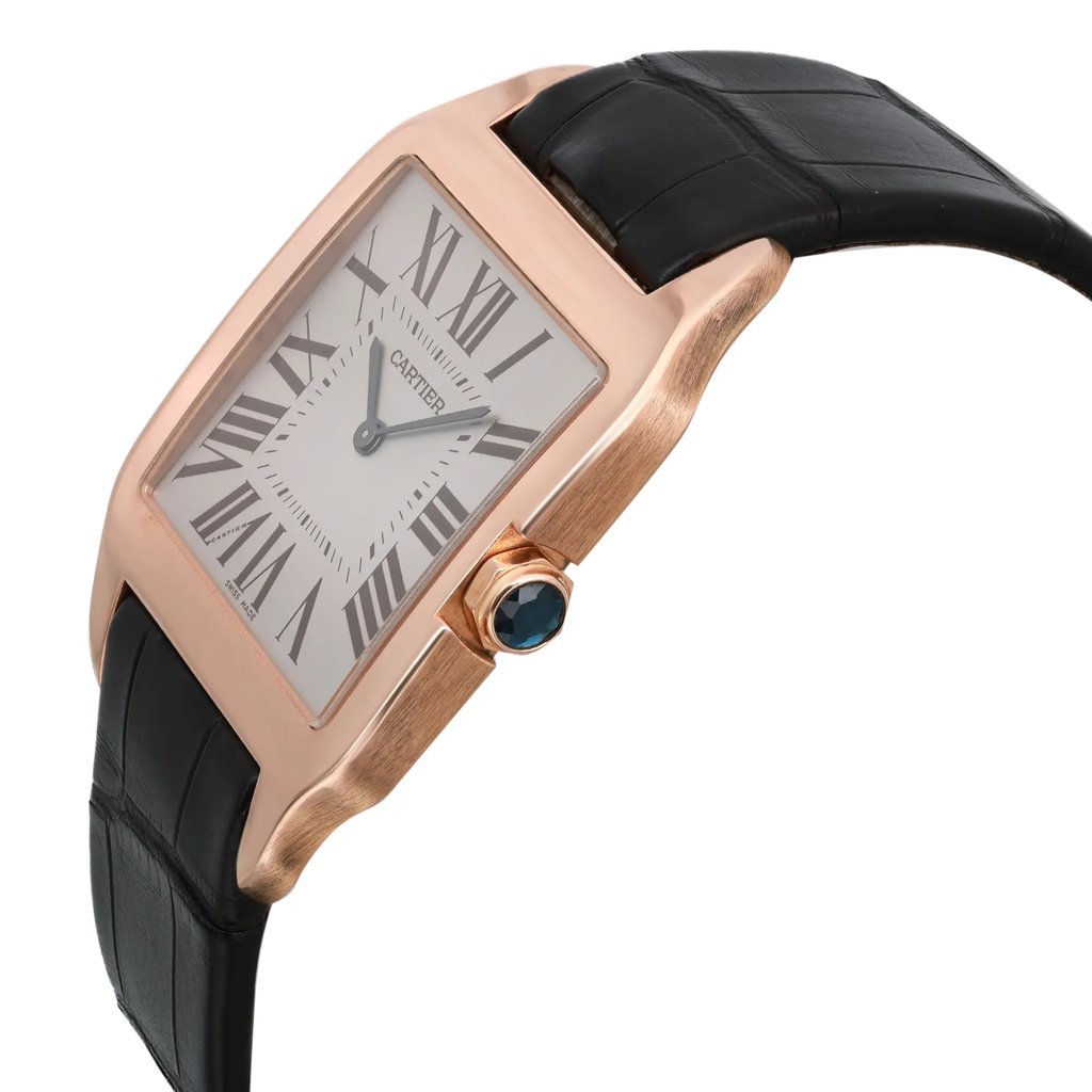 An image of a pre-owned wristwatch shown from a side profile view. The angle highlights the crown on the right side. The watch features a rectangular face with Roman numerals and a black leather strap. The case appears to be a rose gold color, and the crown is adorned with a blue accent. The watch is positioned slightly elevated against a plain background, emphasizing its elegant design.