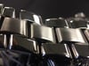 Up Close Front Facing Picture Of Breitling Colt Ocean Stainless Steel Watch Pre Owned Condition