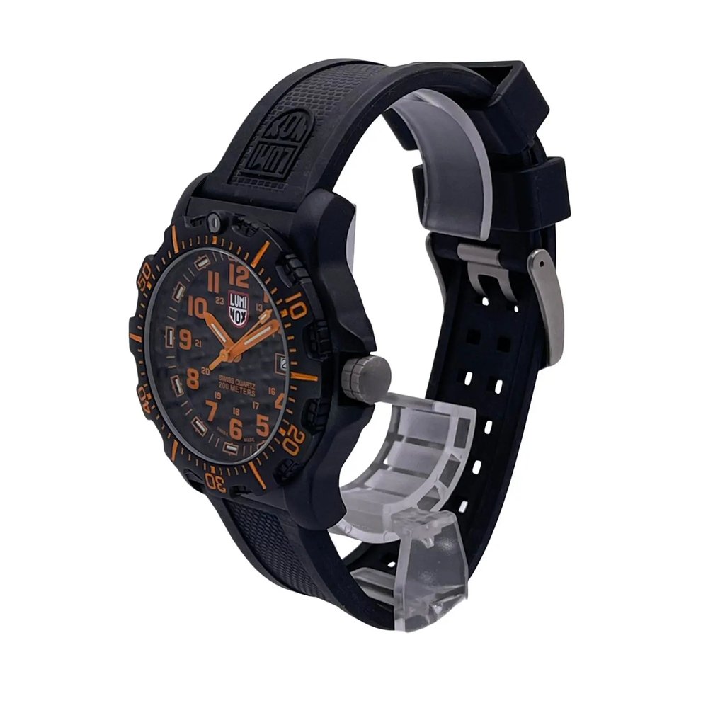 An image of a Wristwatch by Luminox. This Pre Owned item is designed for Men, featuring a Diver style. It has a Quartz movement and an Analog display with a Black dial color. The indices include 12-Hour Dial,24-Hour Dial,Arabic Numerals,Easy to Read/Large Numerals,Multiple Hands,Seconds Hand. The band is made of Rubber and the case is made of Carbon. The watch has a Round shape with a case size of 44 mm and a case thickness of 14 mm.