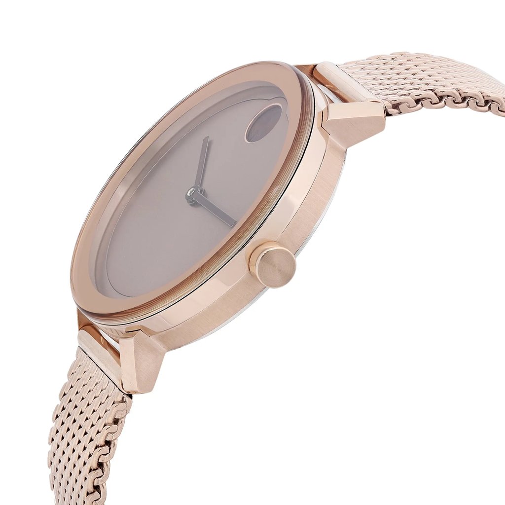 An image of a Wristwatch by Movado. This New With Defects item is designed for Women, featuring a Casual style. It has a Quartz movement and an Analog display with a Rose Gold dial color. The indices include 12-Hour Dial,No Hour Marks. The band is made of Stainless Steel and the case is made of Stainless Steel. The watch has a Round shape with a case size of 34 mm and a case thickness of 7 mm.
