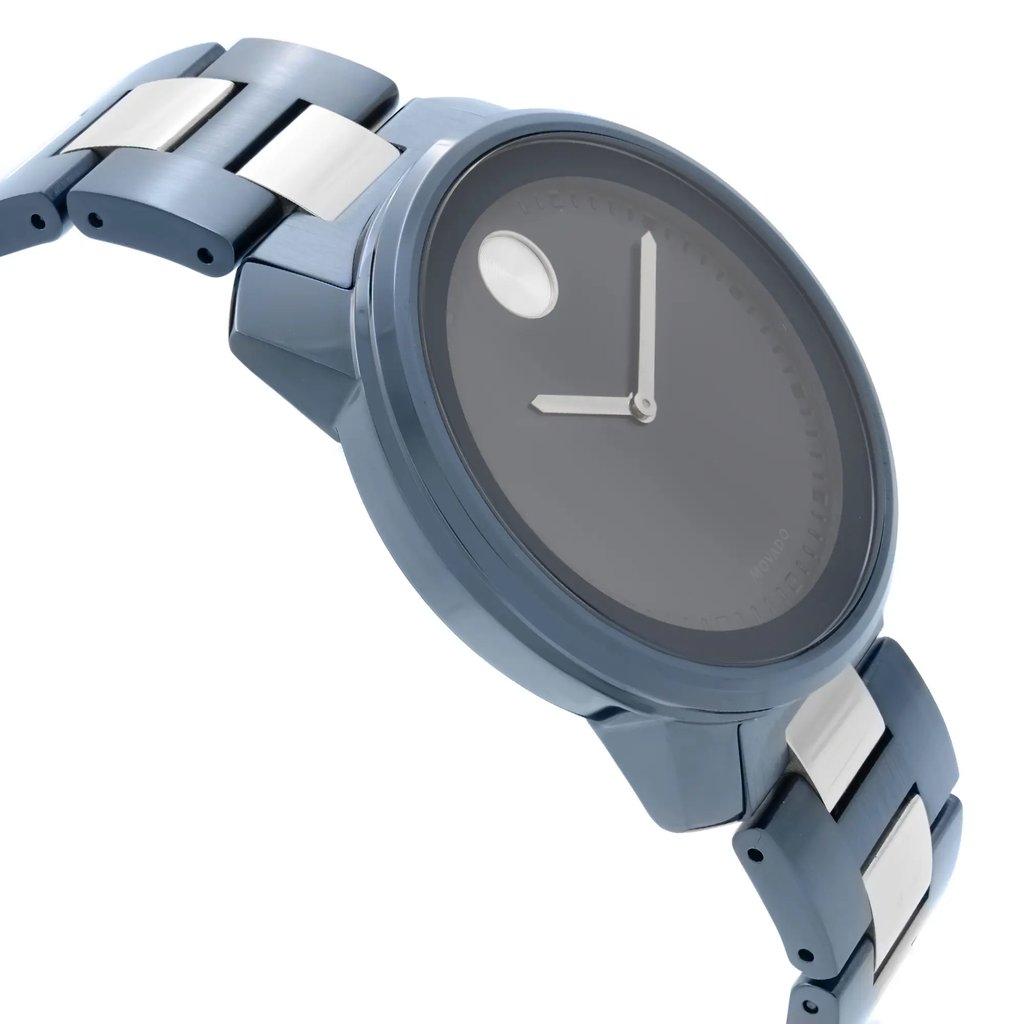 An image of a wristwatch viewed from the side profile, opposite the crown. The watch features a sleek, modern design with a dark, minimalist dial and contrasting silver hour and minute hands. The metal bracelet is visible, showing a combination of matte and shiny links. The watch appears new, though it is noted to have defects. The angle highlights the watch's thickness and the smooth transition between the case and bracelet. The photograph is taken at a medium distance, capturing the watch's details clearly.