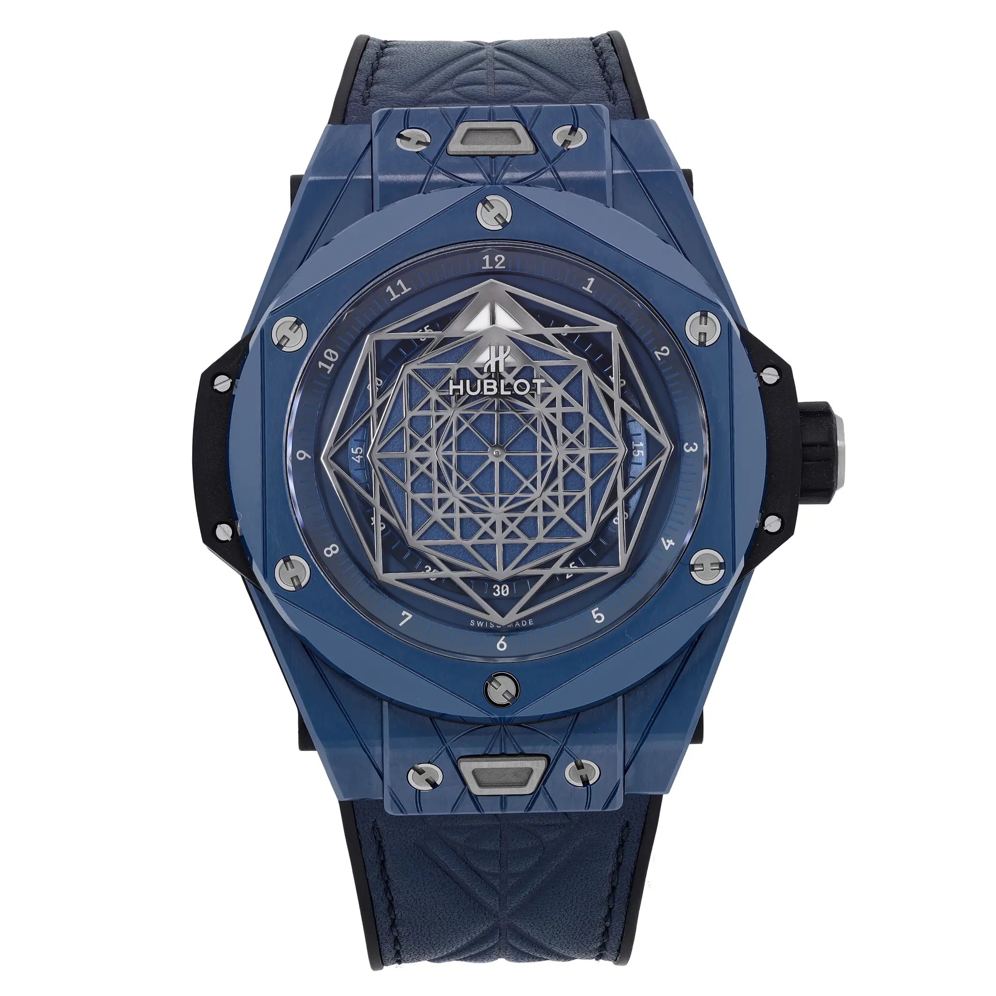 An image of a pre-owned wristwatch captured from a front full frontal view. The watch features a geometric patterned dial and a dark blue strap. The perspective is direct and close-up, highlighting the intricate design details and the overall condition of the timepiece.