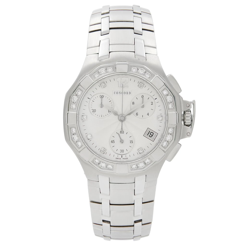 An image of a Wristwatch by Concord. This Pre Owned item is designed for Women, featuring a Dress/Formal,Luxury style. It has a Quartz movement and an Analog display with a Silver dial color. The indices include Diamonds. The band is made of Stainless Steel and the case is made of Stainless Steel. The watch has a Round shape with a case size of 33 mm and a case thickness of 10 mm.