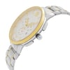 An image of a wristwatch shown from a side profile view with the crown clearly visible. The watch features a silver and gold-toned metal bracelet. The watch face is white with gold accents and multiple subdials. The watch is positioned at a slight angle, highlighting its sleek design and components. The image is taken at a close distance to emphasize detail.