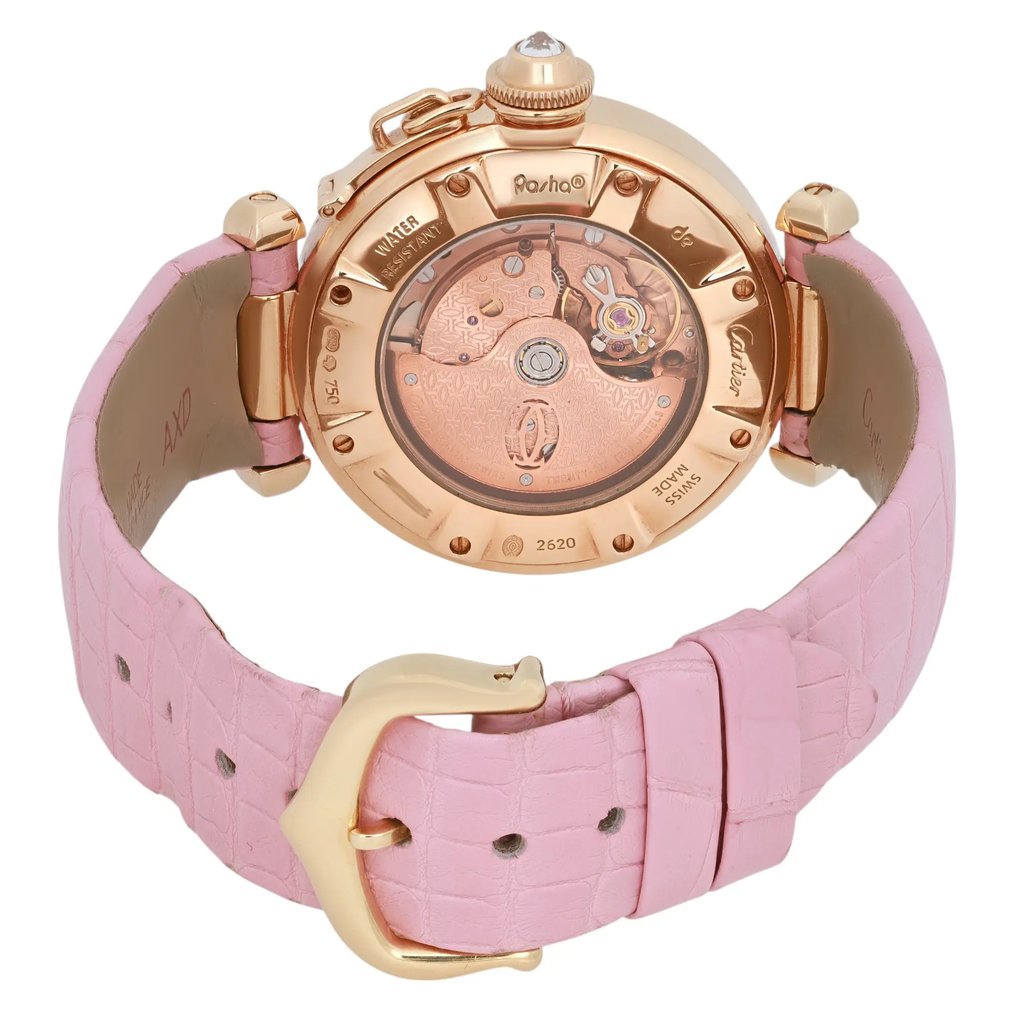 An image of a pre-owned Cartier women's wristwatch captured from the rear at a slight angle, showcasing the intricate inner workings through a transparent case back. The watch features a rose gold case and a date indicator, complemented by a pink leather strap with a gold buckle. The angle highlights the detailed craftsmanship of the movement and the luxurious design elements.