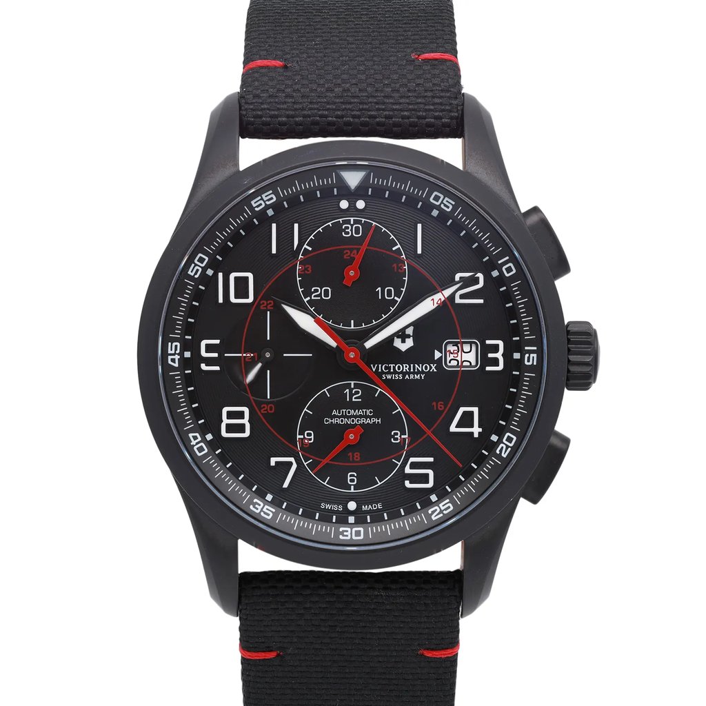 An image of a Wristwatch by Victorinox. This New With Defects item is designed for Men, featuring a Casual style. It has a Mechanical (Automatic) movement and an Analog display with a Black dial color. The indices include 12-Hour Dial,Arabic Numerals. The band is made of Nylon and the case is made of Stainless Steel. The watch has a Round shape with a case size of 42 mm and a case thickness of 15 mm.
