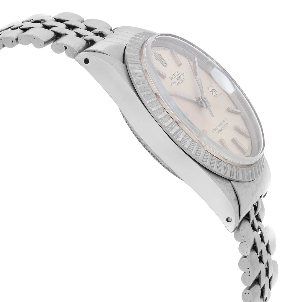 An image of a Wristwatch by Rolex. This Pre Owned item is designed for Men, featuring a Casual style. It has a Mechanical (Automatic) movement and an Analog display with a Silver dial color. The indices include 12-Hour Dial,Stick Indexes. The band is made of Stainless Steel and the case is made of Stainless Steel. The watch has a Round shape with a case size of 36 mm and a case thickness of 12 mm.