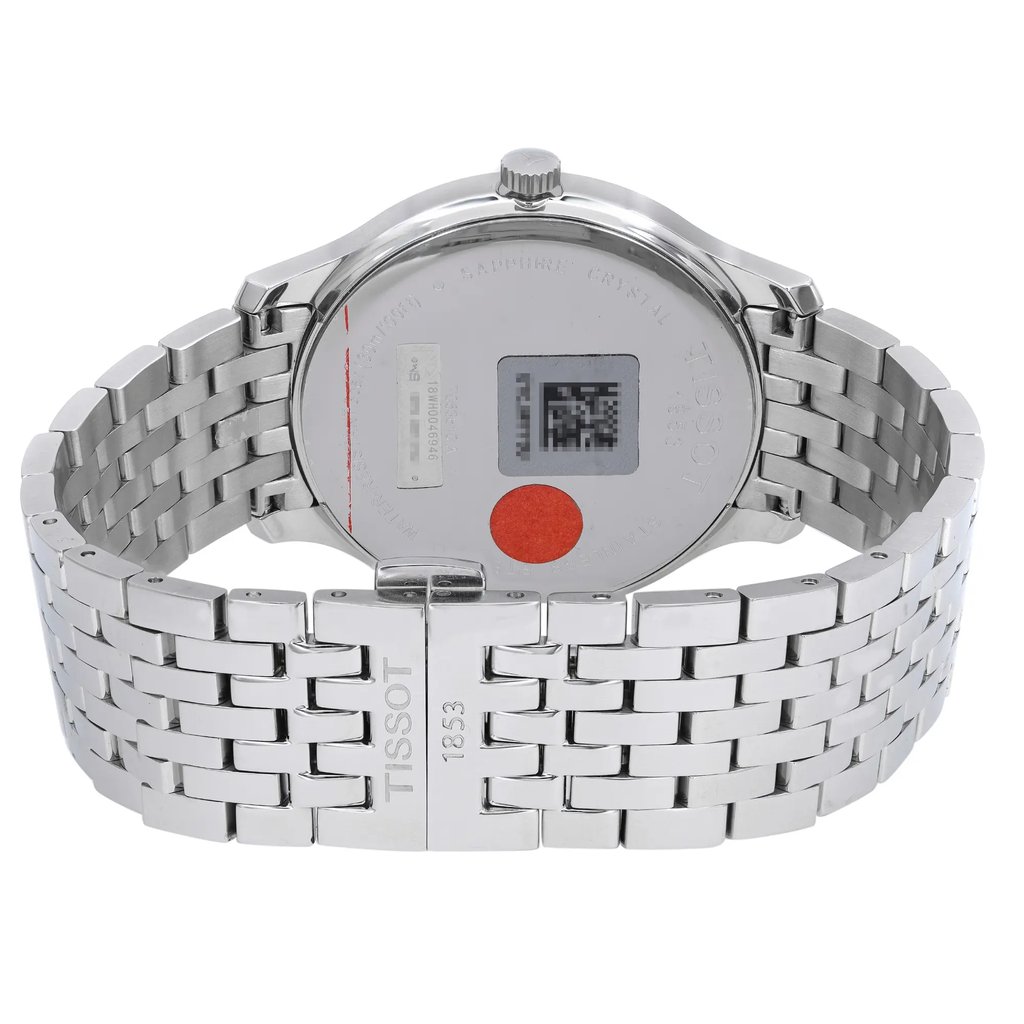 An image of a Wristwatch by Tissot. This Display Model item is designed for Men, featuring a Dress/Formal style. It has a Quartz movement and an Analog display with a Black dial color. The indices include 12-Hour Dial,Stick Indexes. The band is made of Stainless Steel and the case is made of Stainless Steel. The watch has a Round shape with a case size of 42 mm and a case thickness of 8 mm.