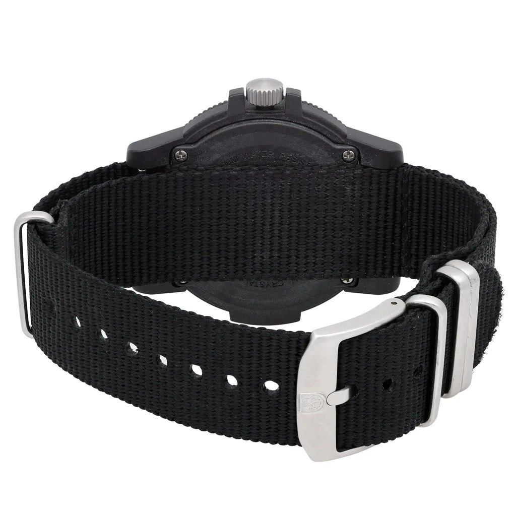 An image of a Wristwatch by Luminox. This Display Model item is designed for Men, featuring a Casual,Classic,Diver,Military style. It has a Quartz movement and an Analog display with a Green dial color. The indices include 12-Hour Dial,Arabic Numerals,Easy to Read/Large Numerals. The band is made of Nylon and the case is made of Carbon. The watch has a Round shape with a case size of 44 mm and a case thickness of 13 mm.