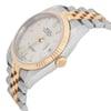 An image of a pre-owned men's Rolex wristwatch, featuring a stainless steel and gold two-tone design. The watch is angled slightly from the side, displaying the face and part of the bracelet. The dial includes a date indicator and luminous hands. The gold bezel and crown enhance its elegant appearance. The photograph captures the watch from a close-up perspective, highlighting its detailed craftsmanship.