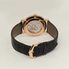 Back View Of Exhibition Back Case And Closed Leather Band Of Patek Philippe 5119R-001 Watch Pre Owned Condition