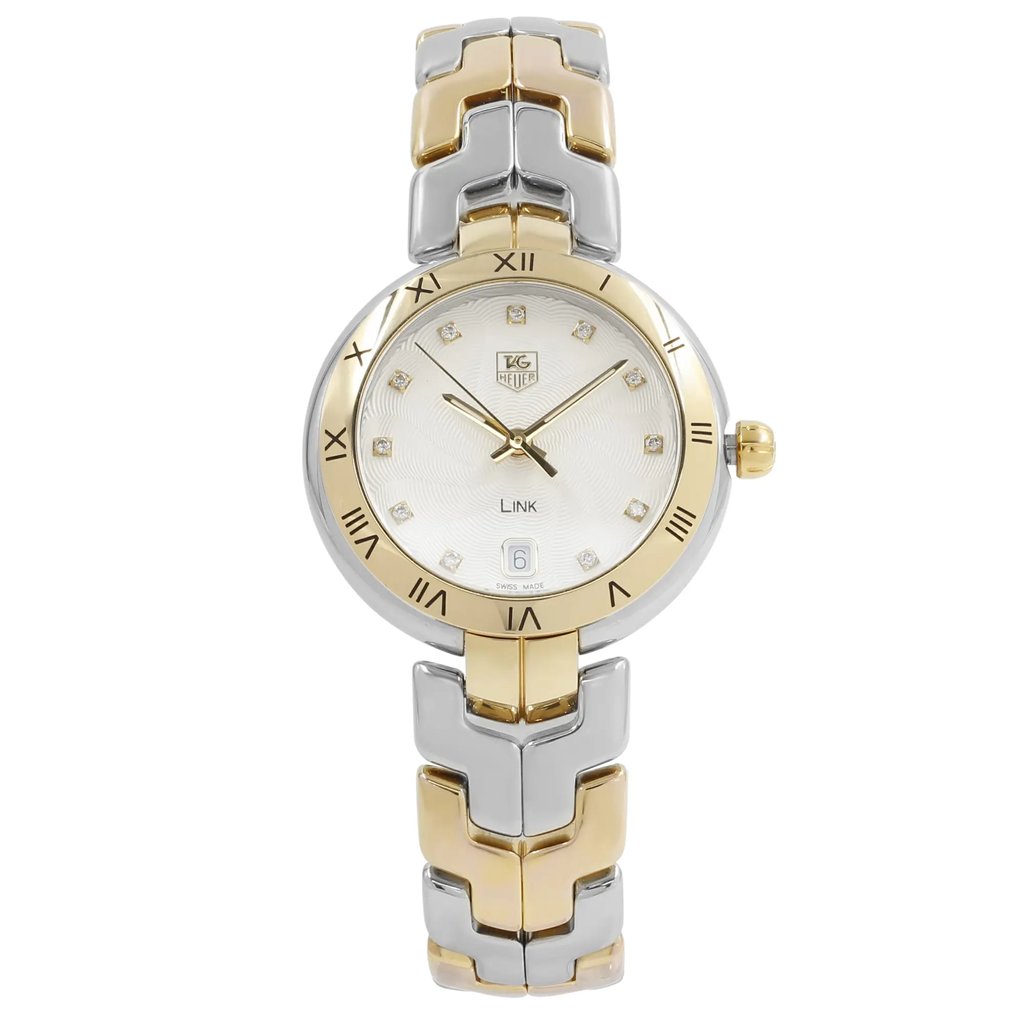 An image of a Wristwatch by TAG Heuer. This Pre Owned item is designed for Women, featuring a Dress/Formal style. It has a Quartz movement and an Analog display with a Silver guilloche dial color. The indices include Diamonds. The band is made of Stainless Steel and the case is made of Stainless Steel. The watch has a Round shape with a case size of 34 mm and a case thickness of 10 mm.