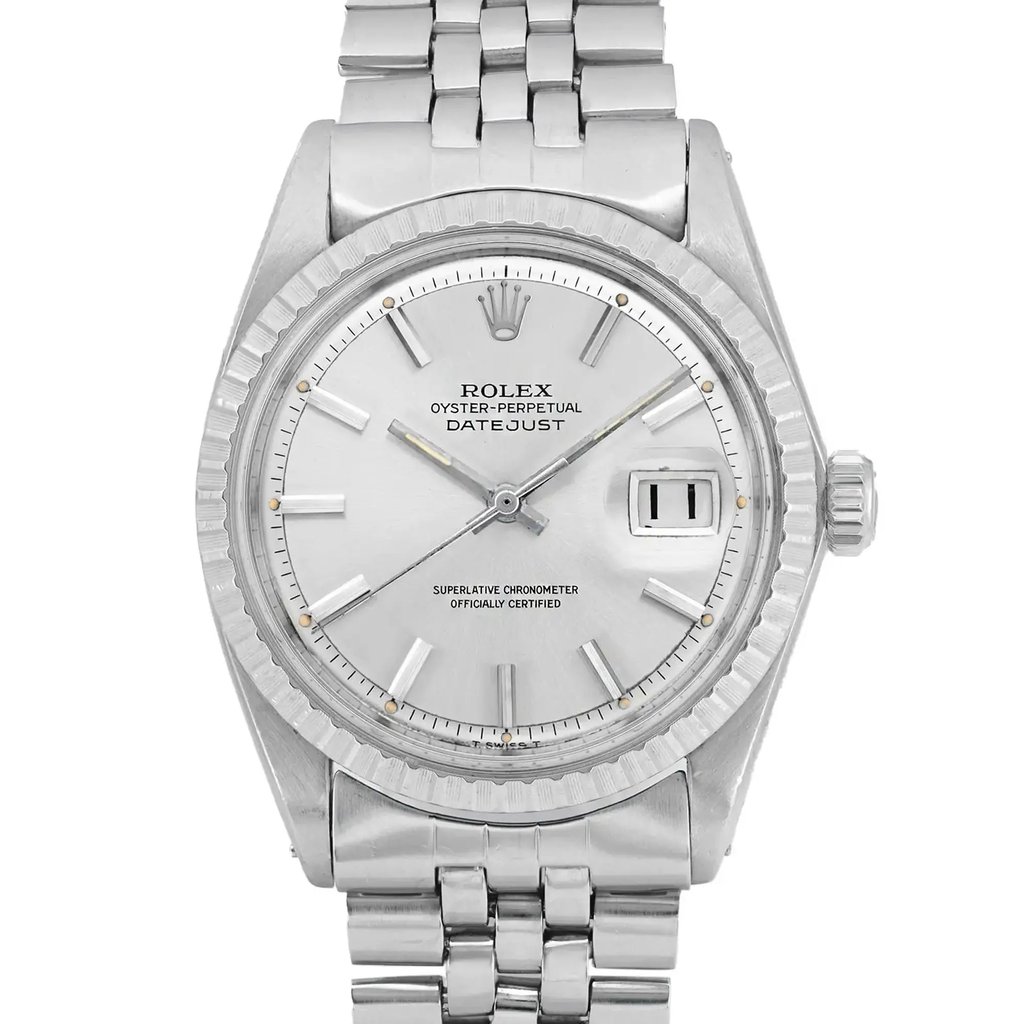 An image of a pre-owned wristwatch taken from a front close-up angle. The watch features a detailed face with a silver dial, silver hour markers, and a date display. The timepiece is complemented by a silver metal bracelet, showcasing a classic and elegant design.