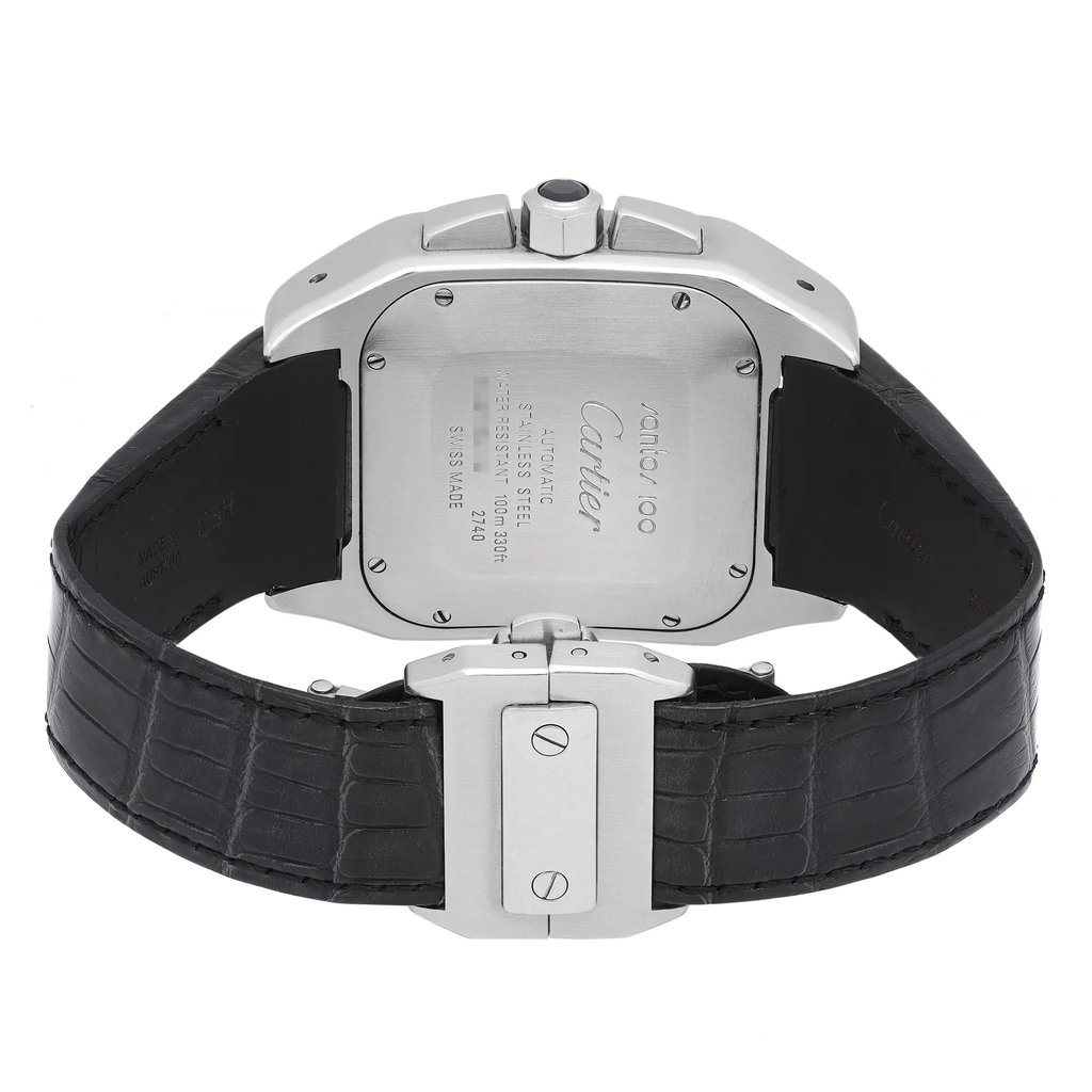 An image of a pre-owned Cartier men's wristwatch with the back view prominently displayed. The watch features a stainless steel screwback case attached to a black leather band. The square case is in clear focus, showing engraved text and details, while the fold-over push-button deployant clasp is partially visible. 