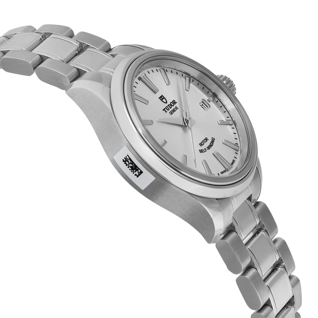 An image of a wristwatch taken from a side profile view, showcasing the opposite side of the crown. The watch is unworn and features a stainless steel bracelet with a brushed and polished finish. The dial is visible at an angle, highlighting the brand name and markers. The shot is taken at a close distance, emphasizing the sleek design and details of the watch's case and bracelet.