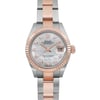 An image of a pre-owned Rolex women's luxury wristwatch in good condition, featuring a front close-up view of the round watch face. The dial is white with a mother of pearl pattern and is adorned with diamond markers indicating the hours, a seconds hand, and a date indicator at the 3 o'clock position. The bezel is rose gold, and the band is made of alternating rose gold and stainless steel links. The case is stainless steel, and the Rolex crown logo is visible at the 12 o'clock position. The watch is positioned directly facing the camera, allowing a detailed view of the watch's features.