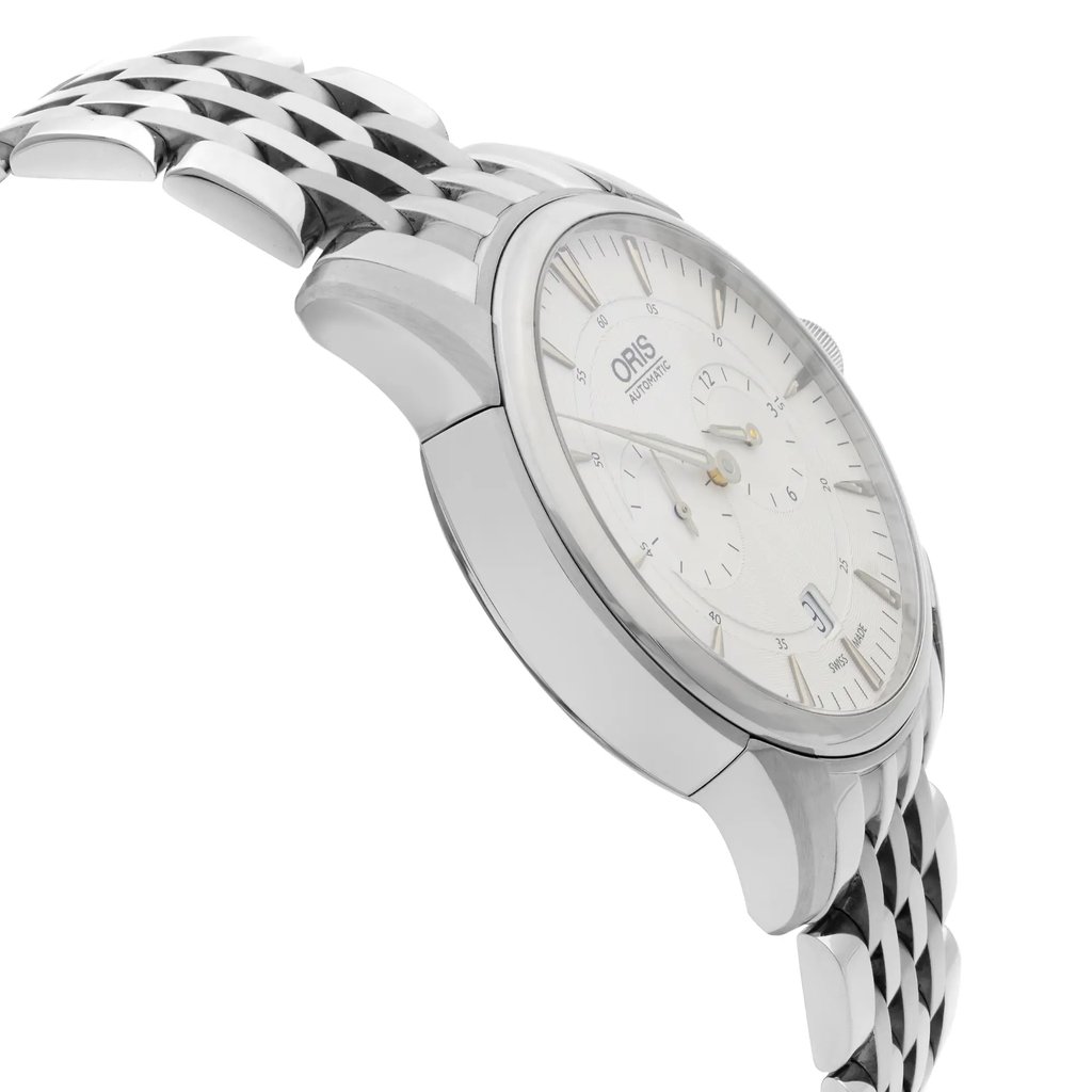 An image of a pre-owned wristwatch viewed from the side profile, opposite the crown. The watch features a polished metal case and a linked metal band. The angle highlights the watch's sleek design and the textured detail on the bracelet. The distance is close enough to capture the intricate features of the watch face and band.
