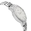 An image of a pre-owned wristwatch viewed from the side profile, opposite the crown. The watch features a polished metal case and a linked metal band. The angle highlights the watch's sleek design and the textured detail on the bracelet. The distance is close enough to capture the intricate features of the watch face and band.