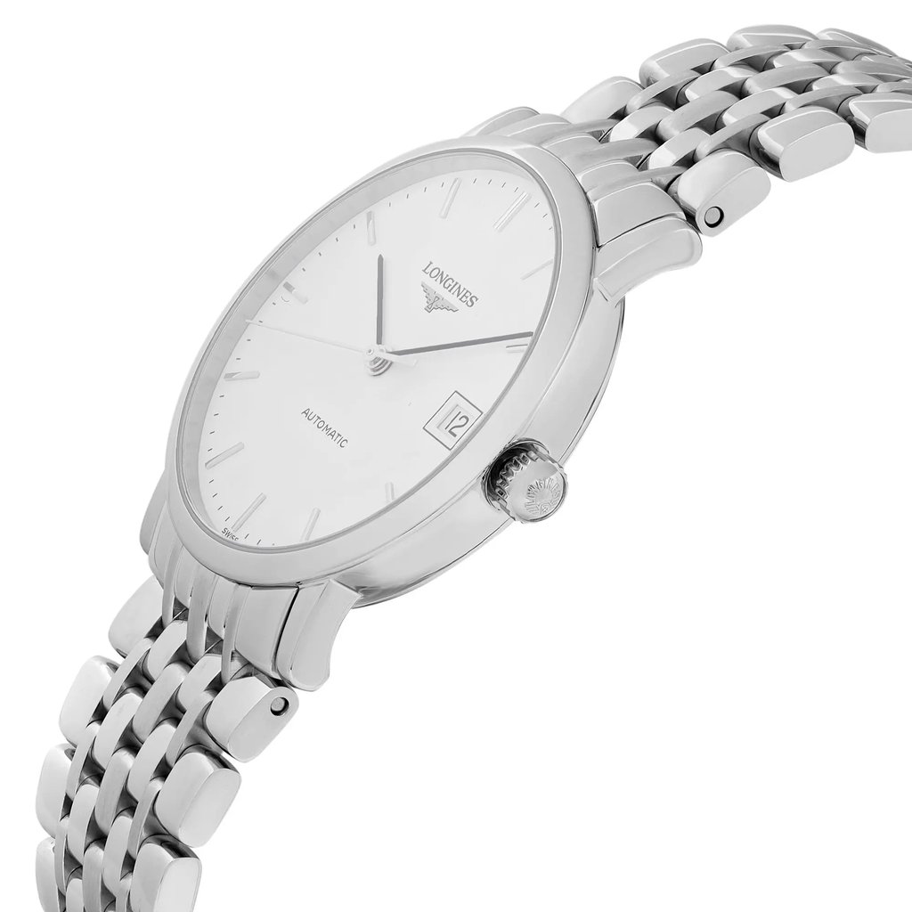 An image of a wristwatch in a side profile view, showcasing the crown prominently. The watch is a display model, featuring a sleek metal bracelet and a clean, minimalist dial with hour markers and a date window. The angle highlights the watch's slim case and elegant design.