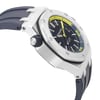 An image of a pre-owned wristwatch shown from a side profile view opposite the crown. The watch features a sturdy case with a visible bezel and a dark strap. The angle highlights the watch face, which includes a mix of dark and bright yellow accents. The photograph is taken at a close distance, showcasing the details of the watch's design.