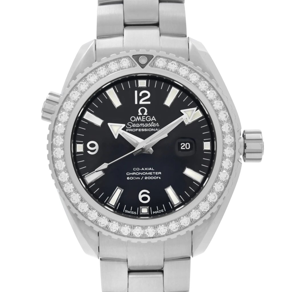 An image of a luxury women's wristwatch by OMEGA, shown in a front close-up shot focusing on the watch face. The watch features a round black dial with Arabic numerals and luminous hands, along with a date indicator. The bezel is steel-colored and the band is made of stainless steel, matching the stainless steel case. The overall condition is excellent, appearing unworn.