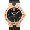 An image of a pre-owned Bvlgari men's wristwatch in good condition, with a close-up front view of the watch face. The watch features a round black dial with gold bezel, round indexes, and a 12-hour dial. The yellow gold case and rubber band are visible, with the band showing signs of wear and light scratches on the watch. The watch is positioned straight on at eye level, allowing clear visibility of the details, including the Bvlgari branding and the words "Automatic," "Chronometer Officially Certified," and "200 m" on the dial.