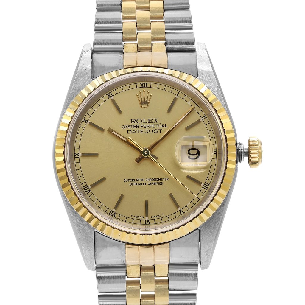 An image of a pre-owned men's Rolex wristwatch, shown in a front close-up shot of the watch face. The luxury watch features a champagne sunburst dial with stick indexes and non-numeric hour marks. The date indicator is visible on the right side of the dial. The round watch face is encircled by a gold bezel, and the band is made of stainless steel and solid gold. The overall condition is classified as good.