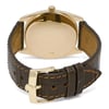 An image of a pre-owned men's Rolex wristwatch, viewed from the back. The watch is positioned at a slight angle, showing the rose gold case and crown. The brown leather strap, featuring prominent stitching, is visible with the gold buckle slightly closer to the camera. The image is taken at a moderate distance to capture the full back view of the watch.