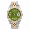 An image of a pre-owned unisex Rolex Datejust 36 Yellow Gold Steel Green Wave Diamond Dial Watch 116233, viewed from the front at a close distance. The watch features a green dial with "Rolex" text pattern, luminous hands, and a date indicator positioned at 3 o'clock. The bezel is yellow gold, complementing the two-tone gold and stainless steel bracelet.Comes with original box and papers. 2015 card. It shows light signs of wear. Recently serviced. The movement is calibrated and keeps time well.

