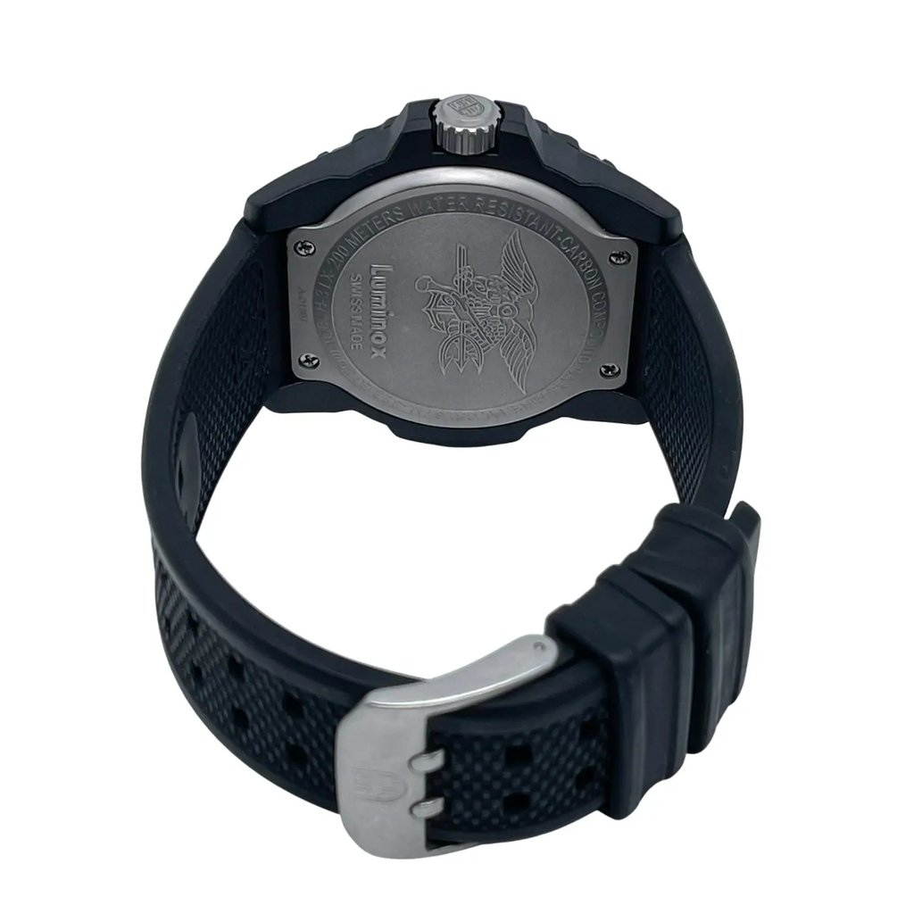 An image of a Wristwatch by Luminox. This Display Model item is designed for Men, featuring a Casual style. It has a Quartz movement and an Analog display with a Black dial color. The indices include 12-Hour Dial,Arabic Numerals. The band is made of Rubber and the case is made of Carbon. The watch has a Round shape with a case size of 45 mm and a case thickness of 14 mm.