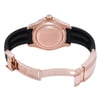 An image of a pre-owned men's Rolex wristwatch viewed from the back at a close distance. The watch is positioned horizontally, showcasing its rose gold case and clasp with an open black strap. The focus is on the back casing and band, highlighting the intricate details and engravings on the clasp.