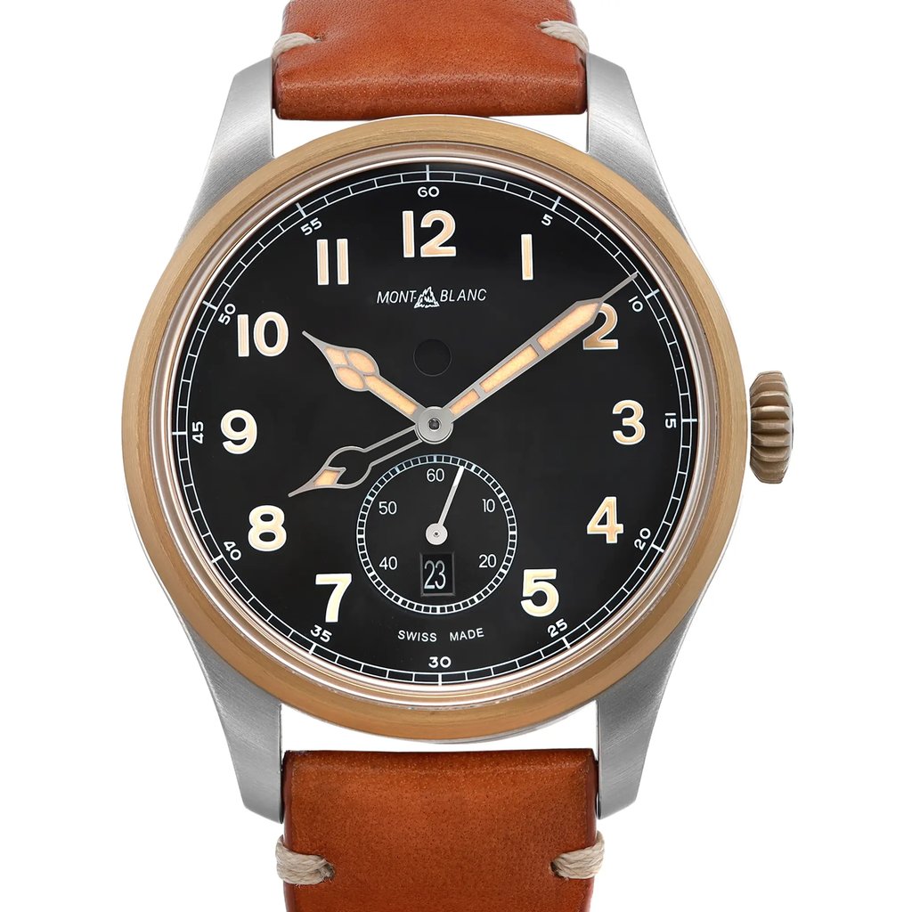 An image of a pre-owned wristwatch, featuring a close-up front view of the watch face. The dial is black with large, bold numerals and elegant, stylized hands. A smaller subdial is positioned above the 6 o'clock mark. The watch has a polished metallic case with a bronze-toned bezel and a brown leather strap. The brand logo is visible below the 12 o'clock position.