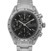 An image of a pre-owned wristwatch taken from a front close-up angle, focusing on the watch face. The watch features a tachymeter bezel and multiple sub-dials. The casing and bracelet are made of metal, giving it a sleek and polished appearance. The dial is marked with the brand name "Omega" and model "Speedmaster Automatic."