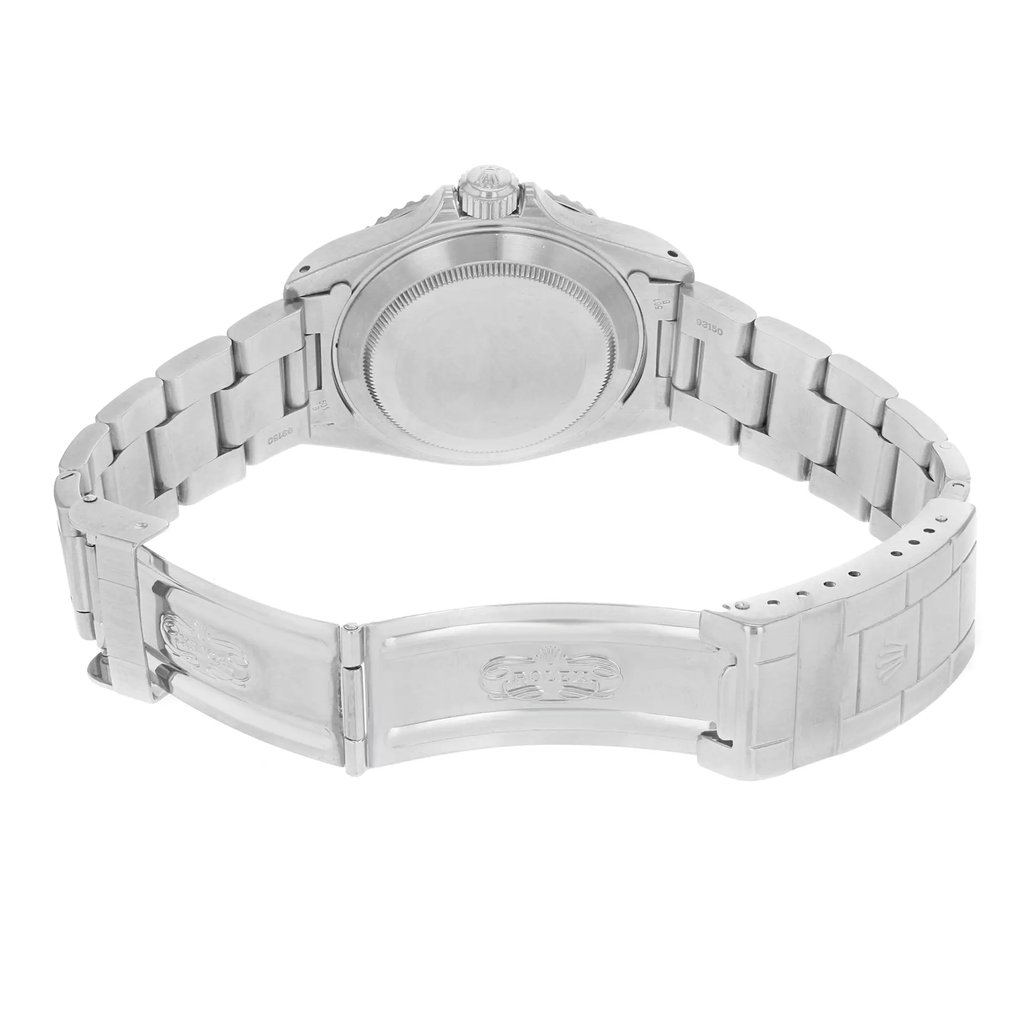 Back View Of Screwback Back Case And Open Stainless Steel Band Of Rolex 14060 Watch Pre Owned Condition