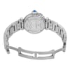 An image of a pre-owned women's Cartier wristwatch positioned at a slight angle, showcasing the back of the watch. The stainless steel bracelet is partially open, revealing the engraved case back. The watch is photographed from a medium distance, clearly displaying the details and inscriptions, including the brand name and specifications.