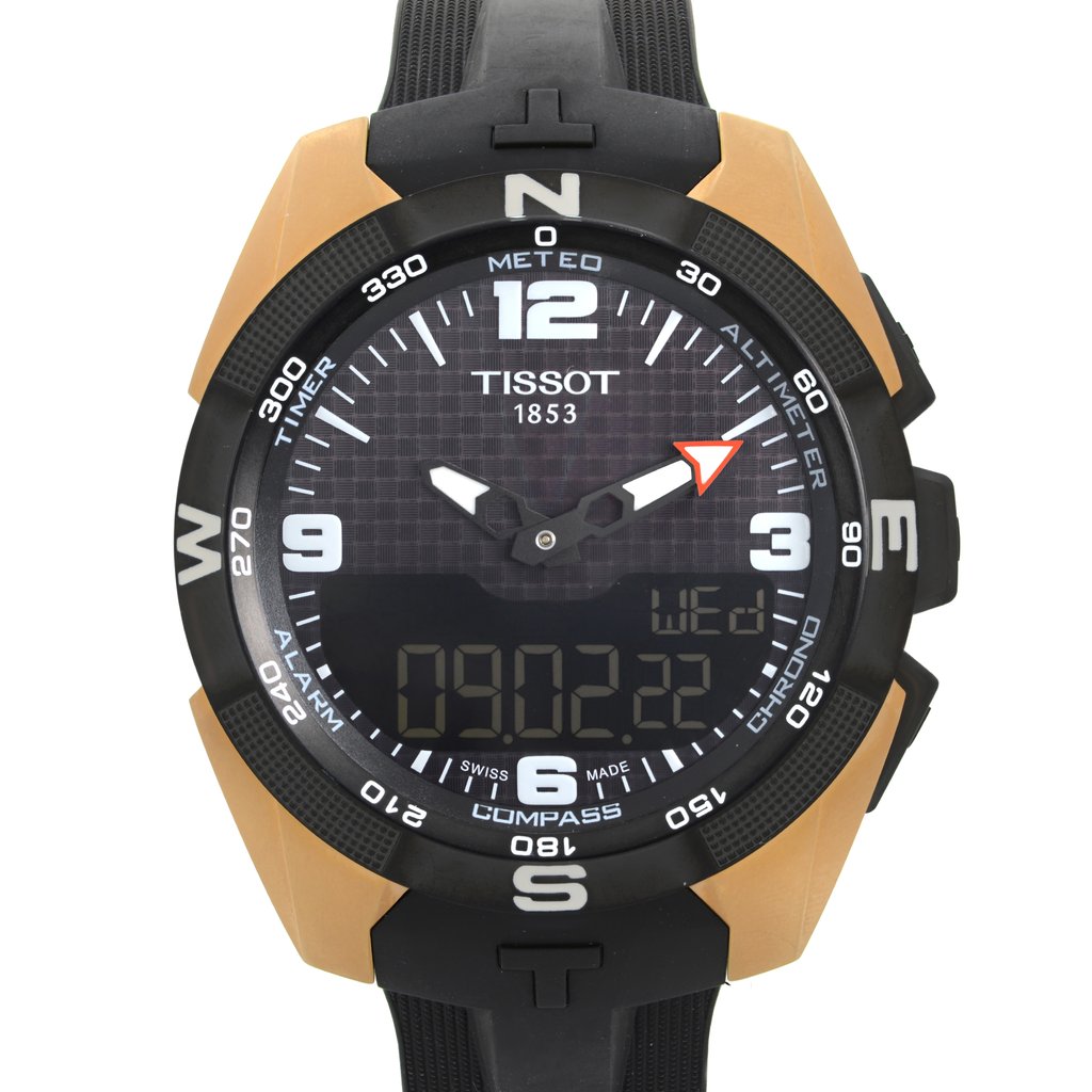 An image of a Wristwatch by Tissot. This New With Defects item is designed for Men, featuring a Sport style. It has a Quartz movement and an Analog & Digital display with a Black dial color. The indices include 12-Hour Dial,Arabic Numerals,Stick Indexes. The band is made of Silicone and the case is made of Titanium. The watch has a Round shape with a case size of 45 mm and a case thickness of 13 mm.