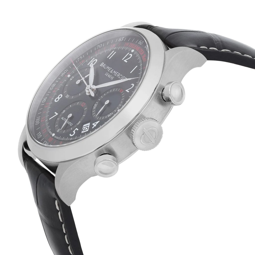 An image of a wristwatch captured from a side profile view, showcasing the crown prominently. The watch features a sleek metal case and a black leather strap with white stitching. The dial is dark with multiple subdials, and the brand name is visible on the face. The watch is positioned at a slight angle, highlighting the textured crown and pushers on the side. The image is taken at a close distance, focusing on the details of the watch's design.