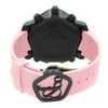 An image of a wristwatch taken from the back view, showcasing the closed clasp. The watch has a pink strap and a black case. The photograph is taken from a slightly elevated angle at a close distance, highlighting the details of the clasp and strap. The watch appears to be a display model.