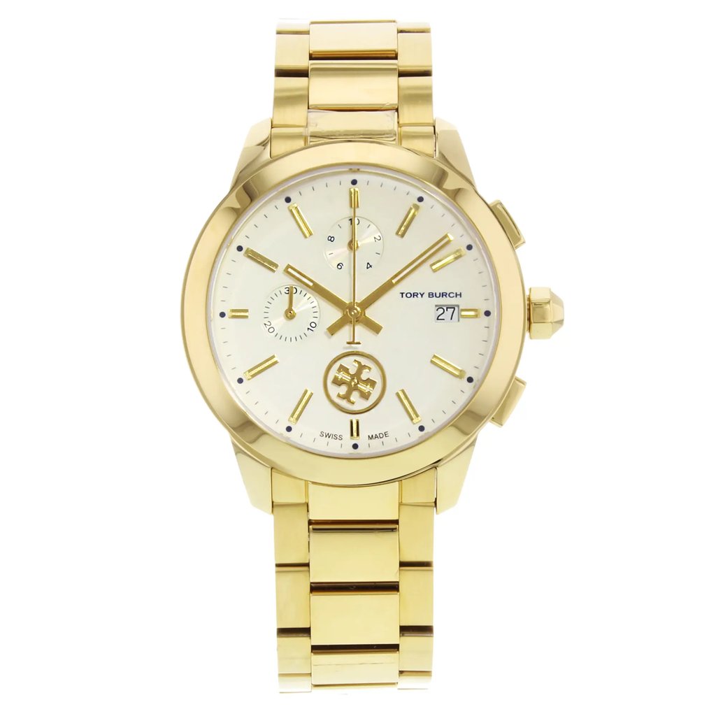 An image of a Wristwatch by Tory Burch. This Pre Owned item is designed for Women, featuring a Casual style. It has a Quartz movement and an Analog display with a Cream dial color. The indices include Non-Numeric Hour Marks,Sticks. The band is made of Stainless Steel and the case is made of Stainless Steel. The watch has a Round shape with a case size of 38 mm and a case thickness of 10 mm.