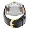 An image of a pre-owned men's Rolex wristwatch viewed from the back at a slight angle. The focus is on the stainless steel case back and the black leather strap with a gold buckle. The watch features a date indicator and luminous hands. The image is taken from a close distance, highlighting the details of the strap and buckle.