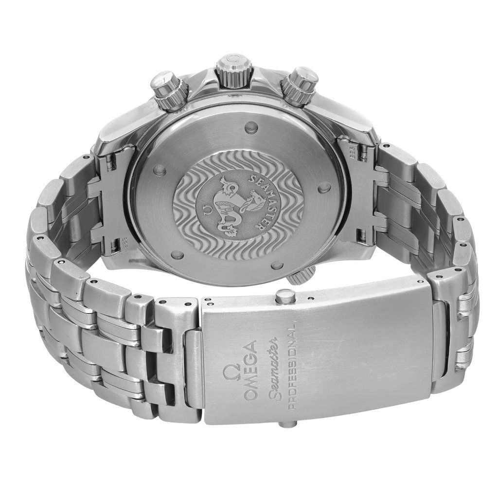 An image of a pre-owned OMEGA men's wristwatch in stainless steel, viewed from the back showing the screwback case with the Seamaster logo and the fold-over clasp with double push buttons. The watch is positioned at a slight angle with the clasp partially open, allowing the back of the watch case to be visible in the center. The band material is also stainless steel and shows minor signs of wear. The watch is photographed up close, with a focus on the caseback and clasp details.