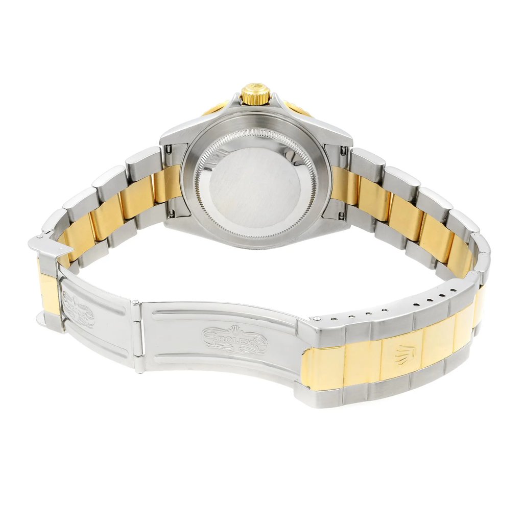 An image of a pre-owned Rolex men's wristwatch, presented in a back view with an open clasp. The watch features a screwback case made of stainless steel and a band composed of stainless and solid gold links. The round shape of the watch is visible from the angle, and the fold-over clasp with a flip lock safety is clearly shown in the unlocked position. The Rolex branding is evident on the band's clasp. The watch is photographed from a direct overhead perspective, capturing the entire back of the watch and bracelet in medium close-up.