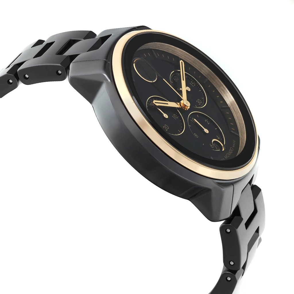 An image of a pre-owned wristwatch shown from a side profile view, opposite the crown. The watch features a black strap and case with a gold bezel. The dial is black with gold accents and multiple subdials, giving a sense of elegance and sophistication. The angle highlights the watch's thickness and design details, taken from a close distance.