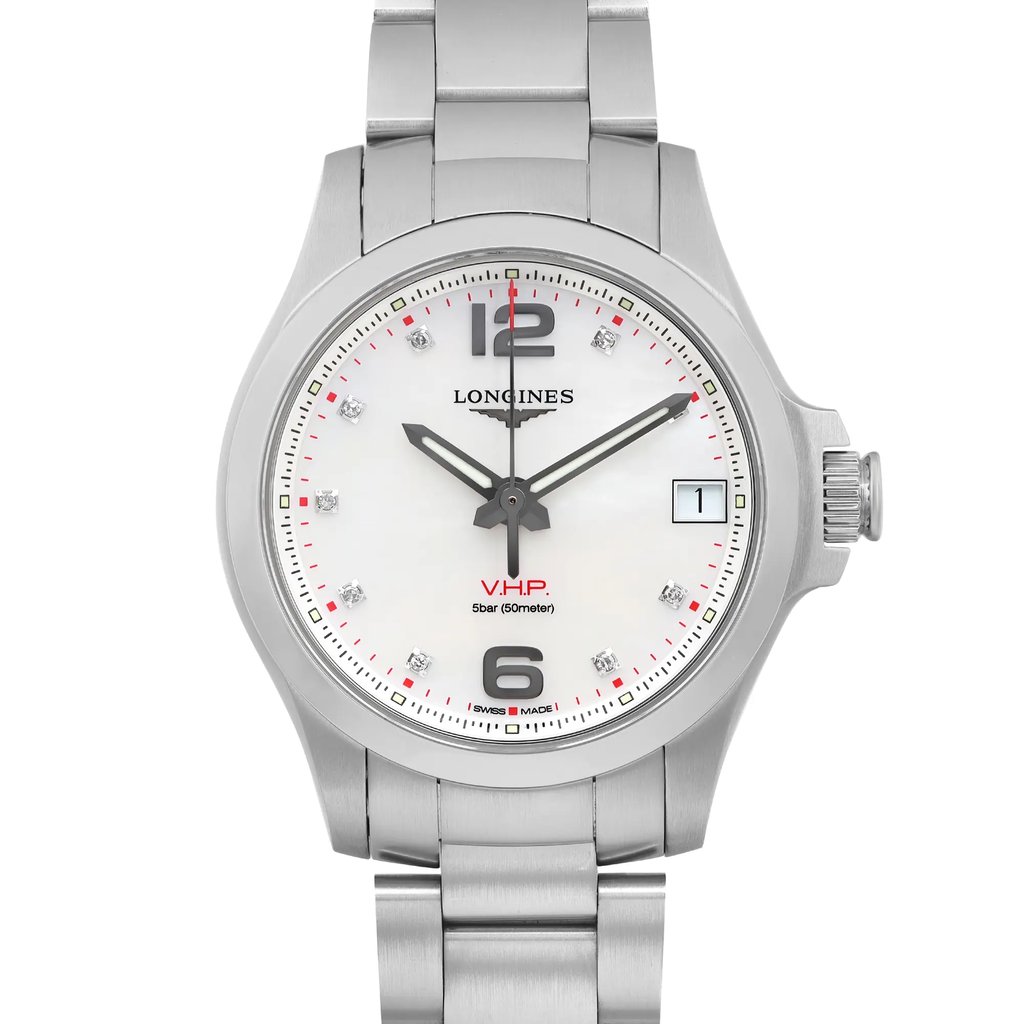 An image of a pre-owned Longines wristwatch in excellent condition, designed for women with a casual style. The photograph is a front close-up shot, showing the watch face at a direct angle with a clear view of the round dial. The dial is white with a mother of pearl pattern, featuring diamond markers at each hour position except for the 12th, 6th, which are indicated by Arabic numerals and a clear black font. The bezel is gray, and the stainless steel band is visible, connecting to the watch face with a seamless transition. The hands are black, and there is a red minute track around the edge of the dial. The watch's stainless steel case reflects light subtly, indicating its shiny surface and well-maintained condition.