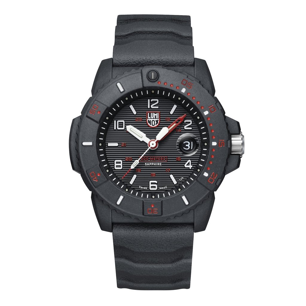 An image of a Wristwatch by Luminox. This Display Model item is designed for Men, featuring a Casual,Classic,Diver,Military style. It has a Quartz movement and an Analog display with a Black dial color. The indices include 12-Hour Dial,Arabic Numerals,Easy to Read/Large Numerals. The band is made of Rubber and the case is made of Carbon. The watch has a Round shape with a case size of 45 mm and a case thickness of 15 mm.