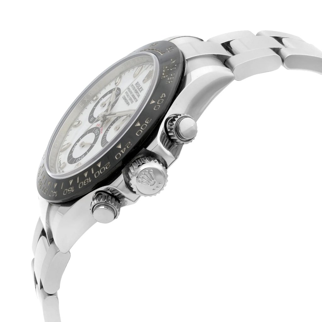 An image of a pre-owned men's Rolex wristwatch in excellent condition, viewed from a side profile angle. The watch features a white dial and a round black bezel, highlighting its chronograph functions. The stainless steel case and band are prominently displayed, with the crown clearly visible. The wristwatch is captured up close, showcasing its sporty style and intricate details.