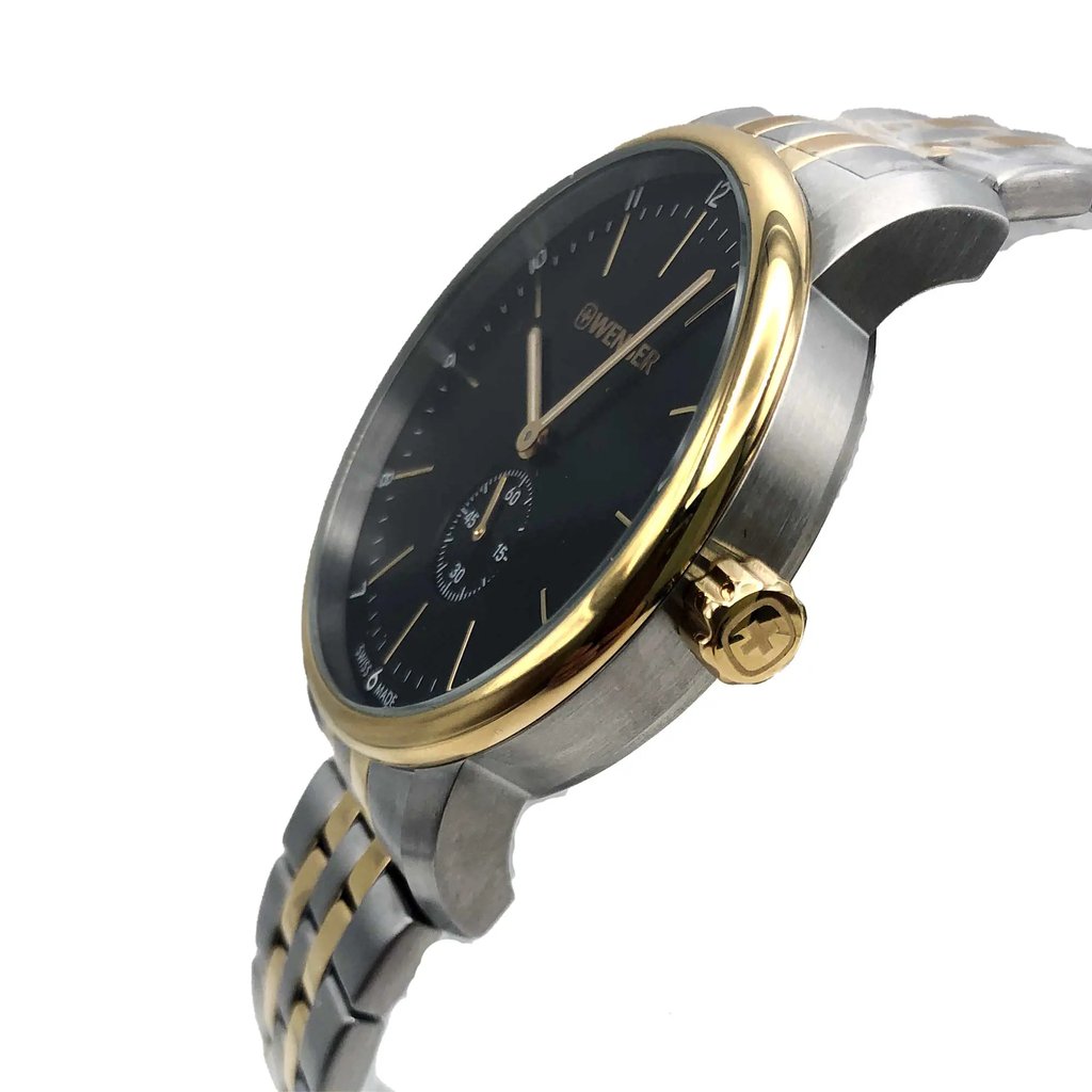 An image of a Wristwatch by Wenger. This New With Defects item is designed for Men, featuring a Dress/Formal style. It has a Quartz movement and an Analog display with a Black dial color. The indices include 12-Hour Dial,Arabic Numerals,Stick Indexes. The band is made of Stainless Steel and the case is made of Stainless Steel. The watch has a Round shape with a case size of 42 mm and a case thickness of 10 mm.